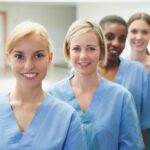 healthcare professionals wearing blue scrubs