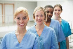 healthcare professionals wearing blue scrubs